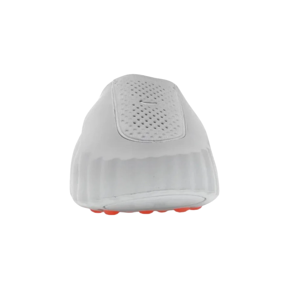 Nike Mind 001 Slide in Light Smoke Grey, featuring a foam construction and orange rubber pods on the sole.