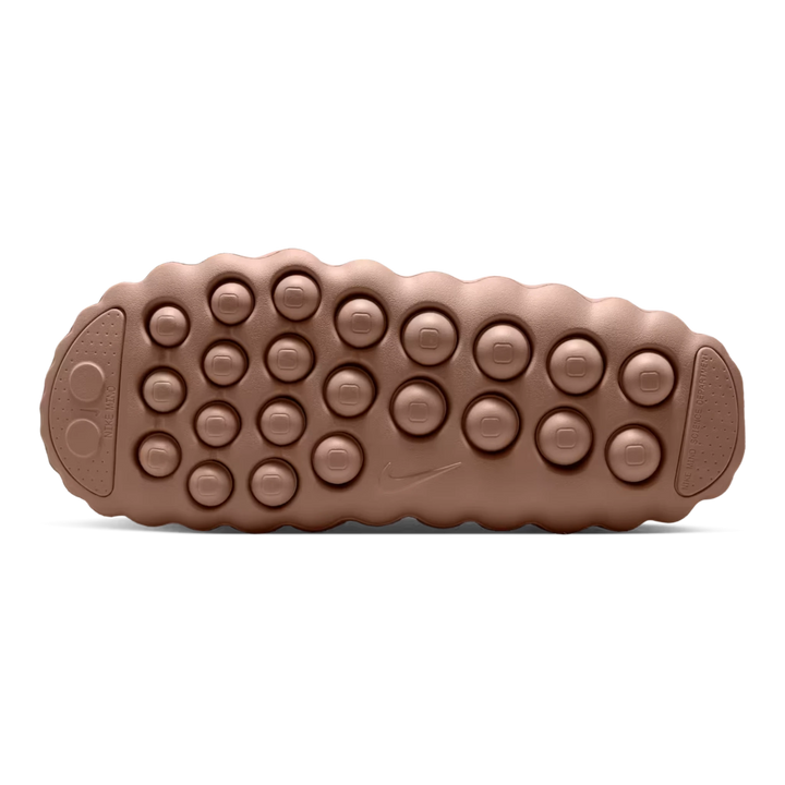 HypeSelection Nike Mind 001 slide in hemp and rattan featuring 22 responsive underfoot sensory nodes on the outsole.