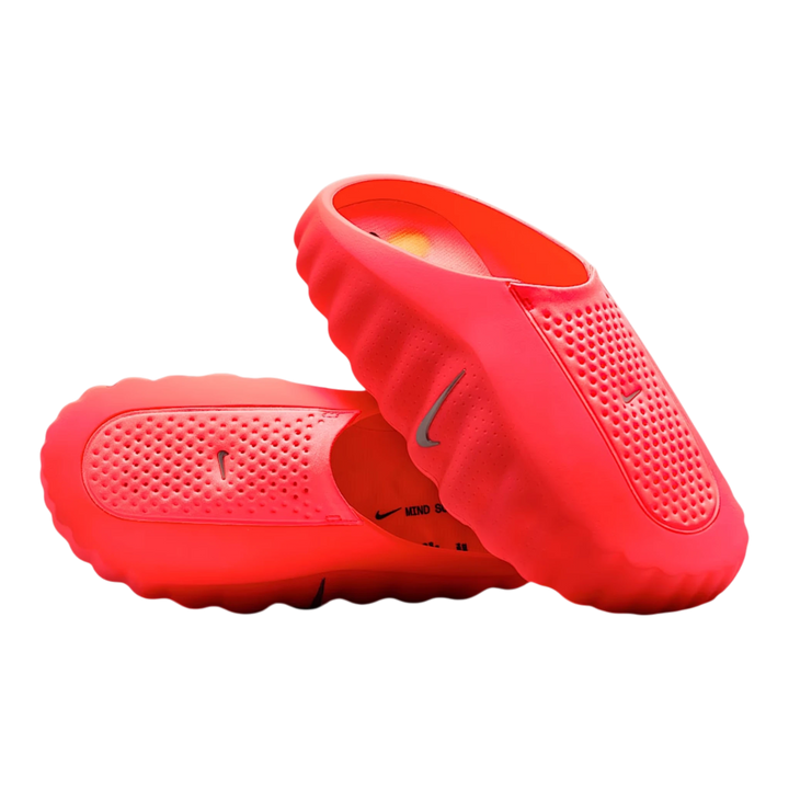 HypeSelection Nike Mind 001 Slide in vibrant Solar Red, featuring a one-piece foam construction with perforated details and a sculpted outsole.