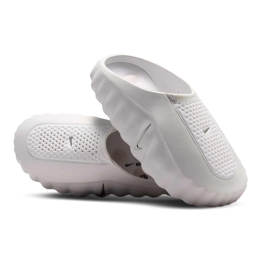 HypeSelection Nike Mind 001 slides in Summit White featuring a textured foam node design and perforated upper