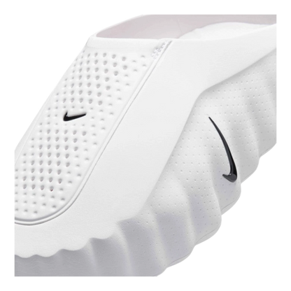 HypeSelection Nike Mind 001 white foam slide with perforated top panel, Obsidian Swoosh, and Speed Red nodes underfoot.