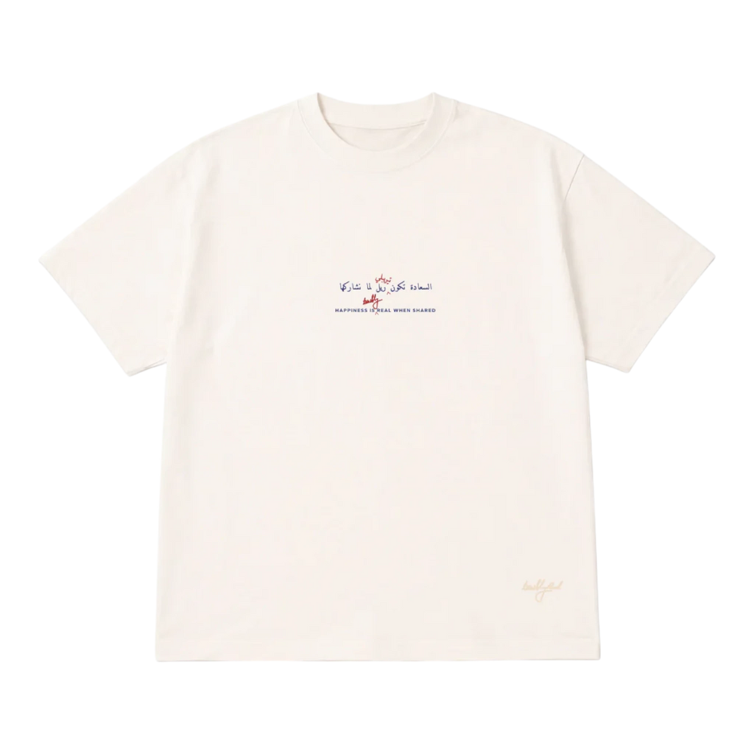 HypeSelection Off-White cotton t-shirt with Arabic script and 'Happiness is Real When Shared' text.
