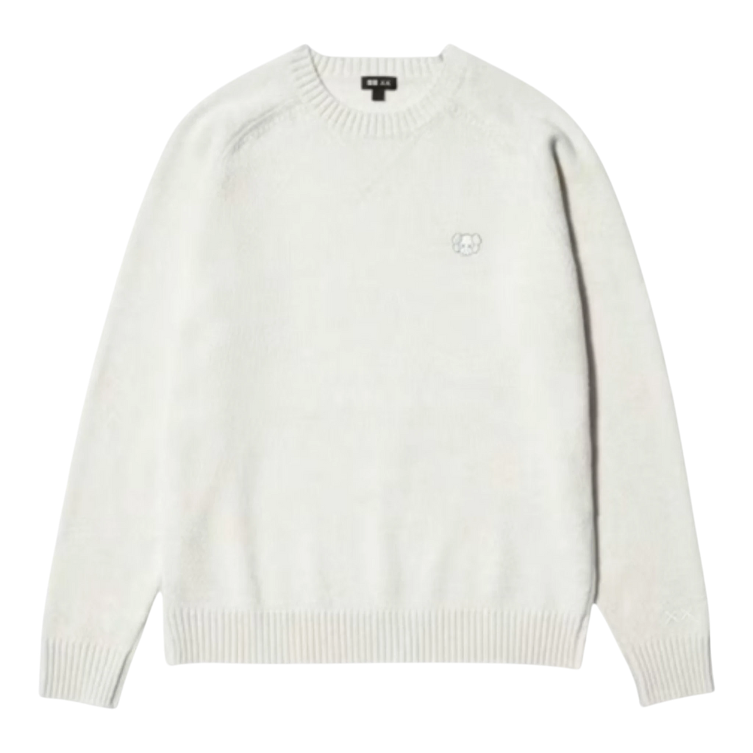 HypeSelection Uniqlo x KAWS off-white lambswool crew neck sweater with subtle embroidered KAWS figure on chest.