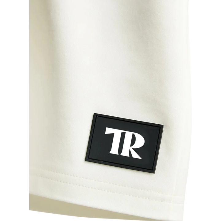 HypeSelection off-white heavyweight terry cotton t-shirt with oversized fit and black TR logo patch.