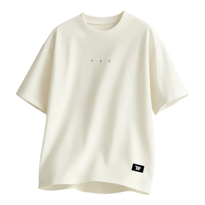 HypeSelection Off-White terry cotton oversized tee with subtle "UAE" print and "TR" logo tag.