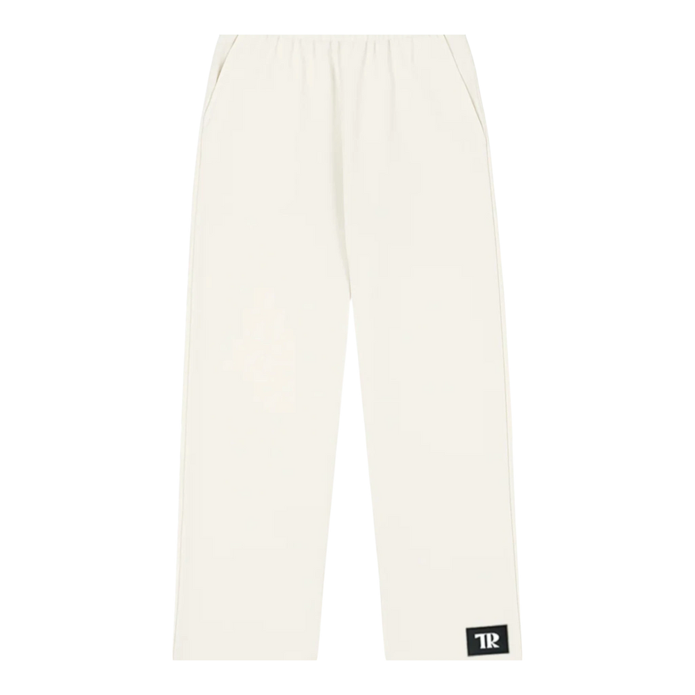 HypeSelection off-white wide-leg sweatpants made from a cotton blend fabric with an elastic waistband and side pockets.