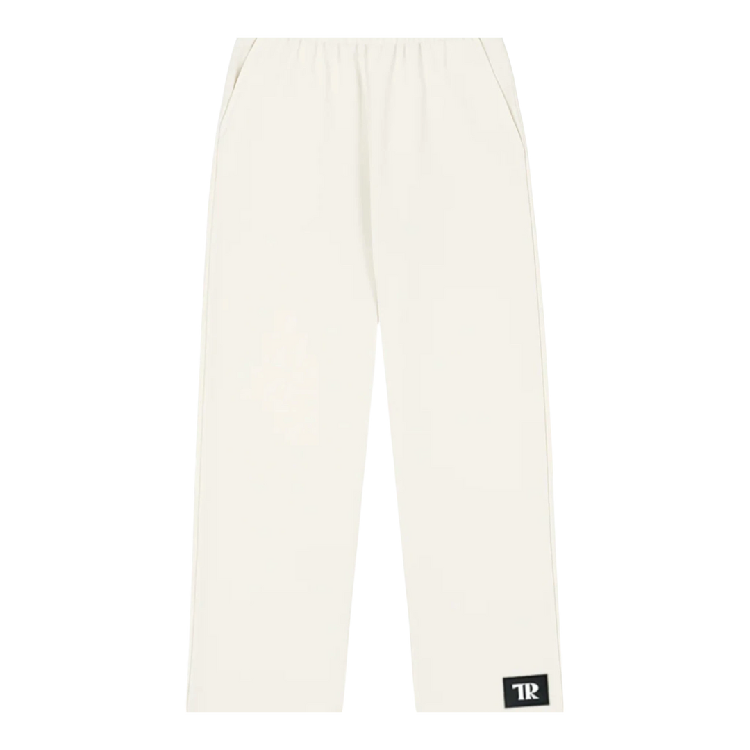 HypeSelection off-white wide-leg sweatpants made from a cotton blend fabric with an elastic waistband and side pockets.