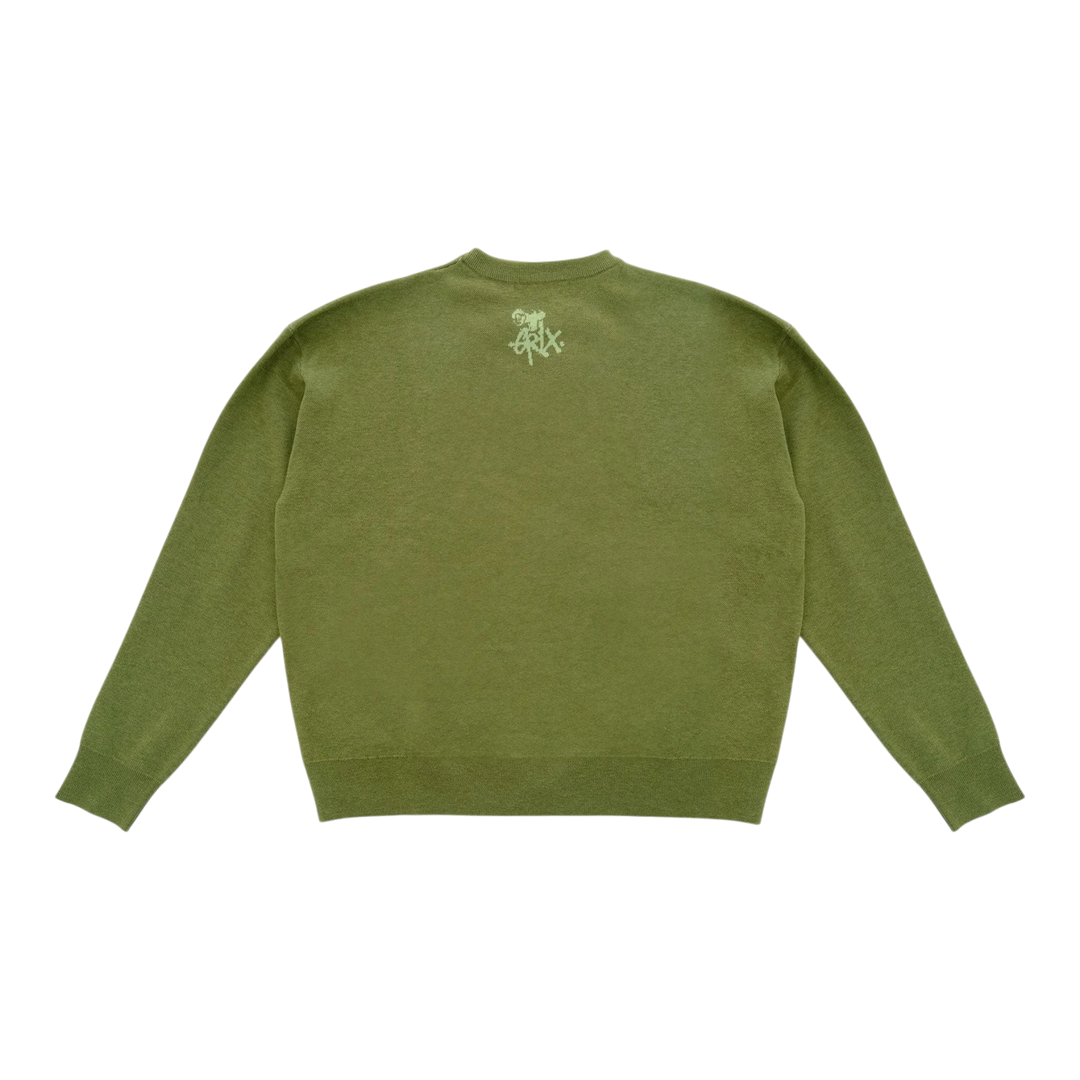 HypeSelection olive green knit sweater with a subtle starry pattern and Grawlixes logo on the back. Relaxed fit, ideal for streetwear.