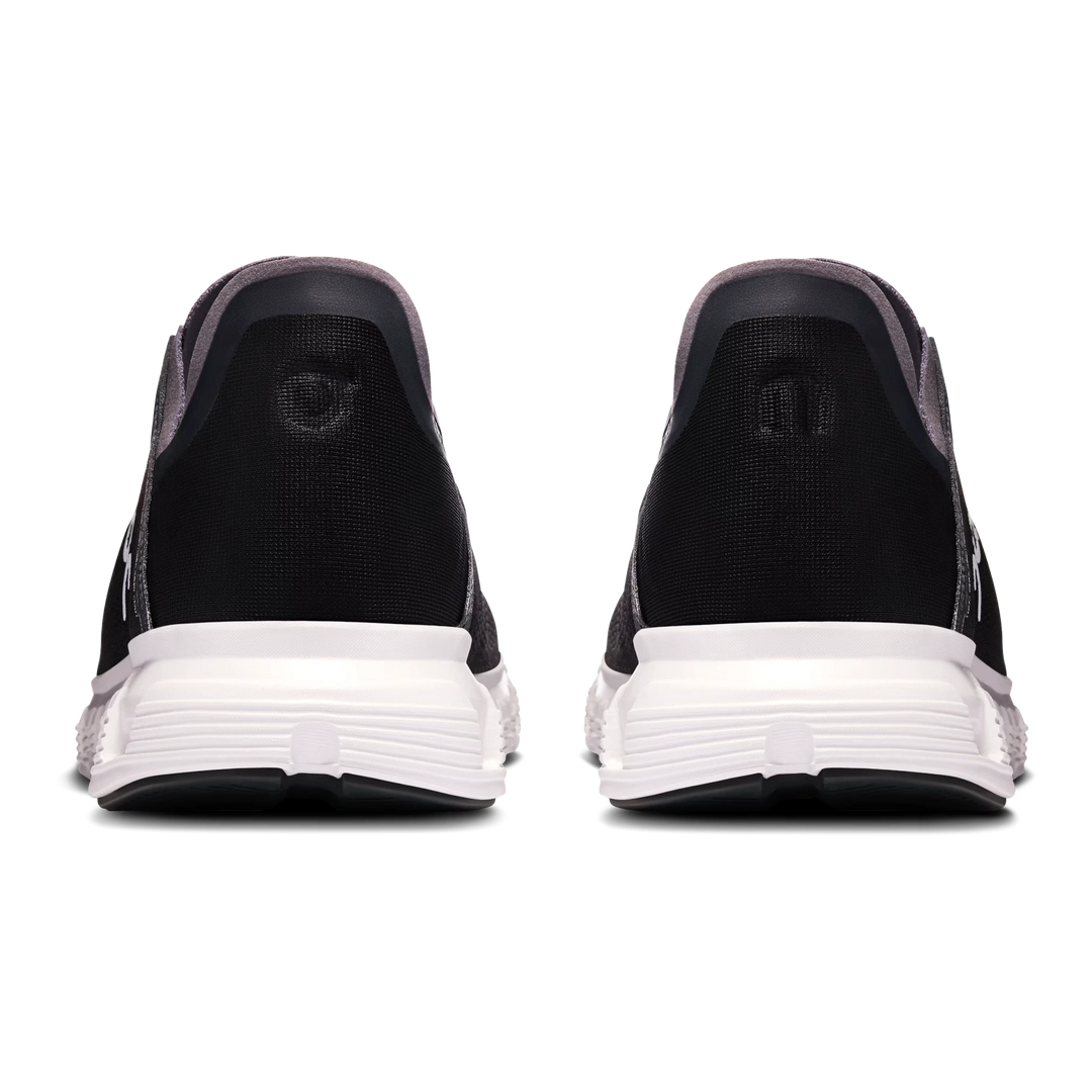 HypeSelection On Cloud 6 Coast sneakers in black and white, showing the rear view with cushioned kick-down heel design.