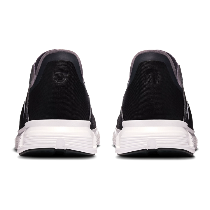 HypeSelection On Cloud 6 Coast sneakers in black and white, showing the rear view with cushioned kick-down heel design.