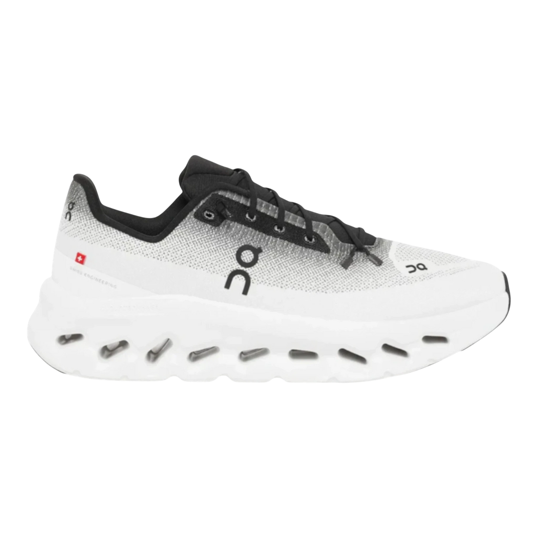 HypeSelection men's On Cloudtilt 1 M sneakers in black and ivory. Lightweight engineered mesh upper with speed lacing and CloudTec Phase™ cushioning.