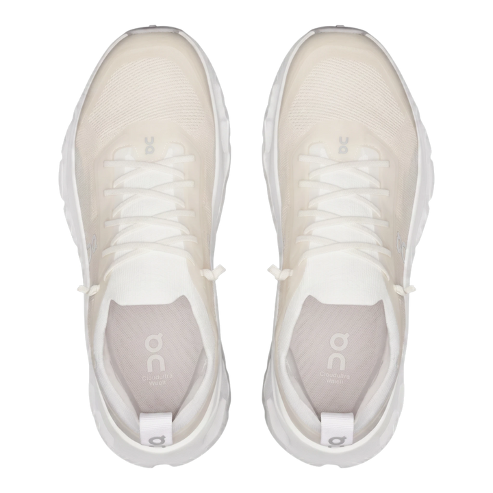 Top view of HypeSelection On Cloudtilt Moon sneakers in white and frost with a breathable knit upper and speed lacing.