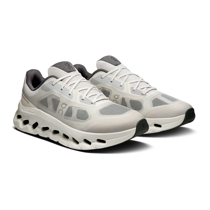 HypeSelection On Cloudtilt Remix sneakers in alloy and ivory with layered translucent overlays and cushioned midsole.