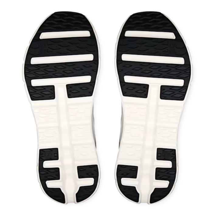 HypeSelection On Cloudtilt Remix sneakers showing the black and ivory rubber outsole tread pattern.