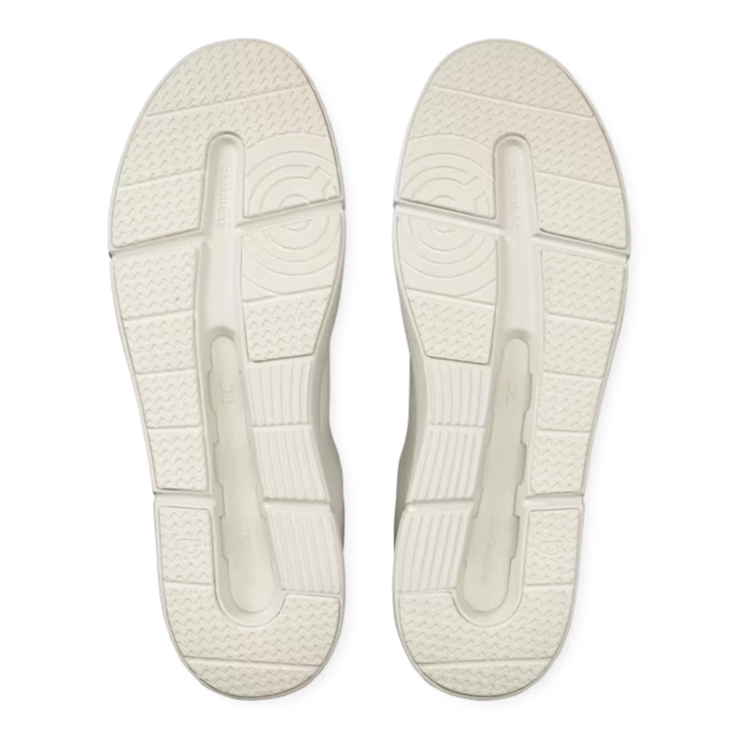 HypeSelection On THE ROGER Advantage white sneakers showing the textured CloudTec rubber outsoles from below