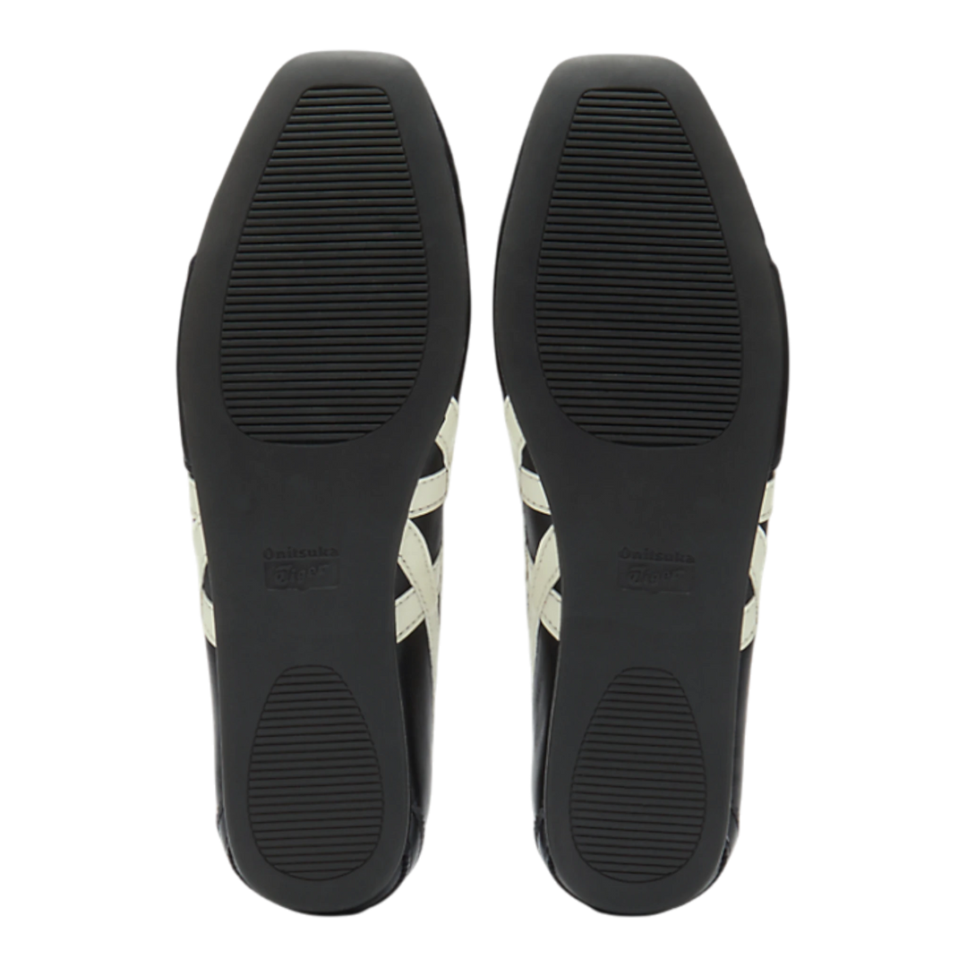 HypeSelection Onitsuka Tiger GYMNARINA ballet-inspired shoes in black and cream, showing the textured rubber outsoles.