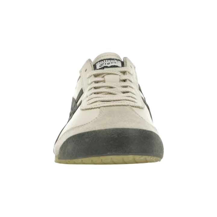 Onitsuka Tiger Mexico 66 sneakers in birch and peacoat navy. Leather and suede construction with signature stripes.