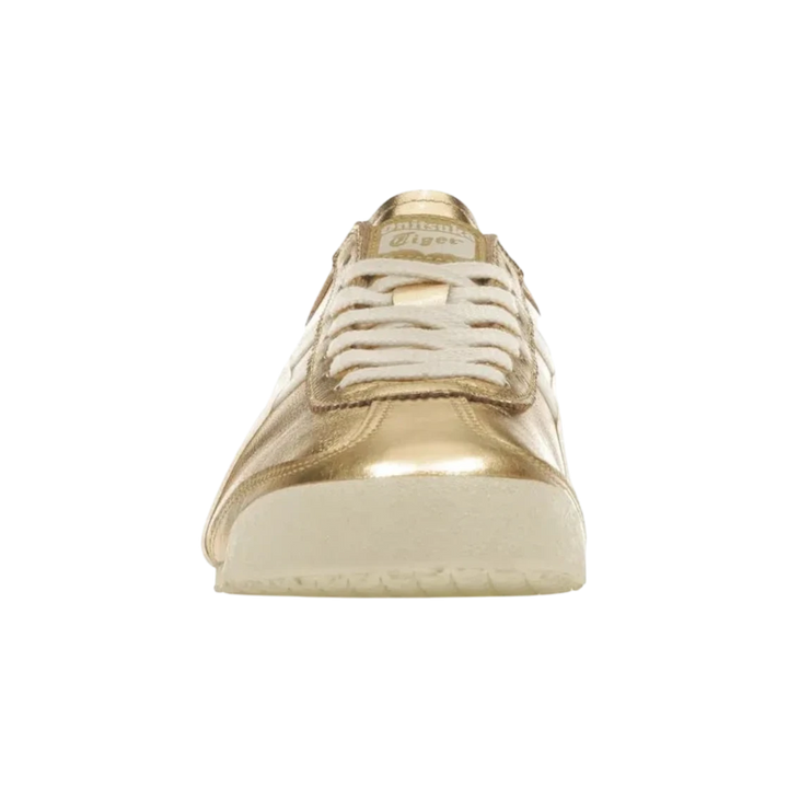 Onitsuka Tiger Mexico 66 gold and white leather sneakers with lace-up closure and signature stripes.