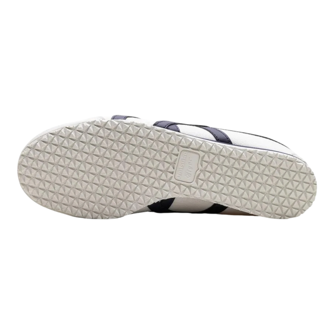 HypeSelection Onitsuka Tiger Mexico 66 Slip-On sneaker showing the textured rubber outsole in birch and midnight
