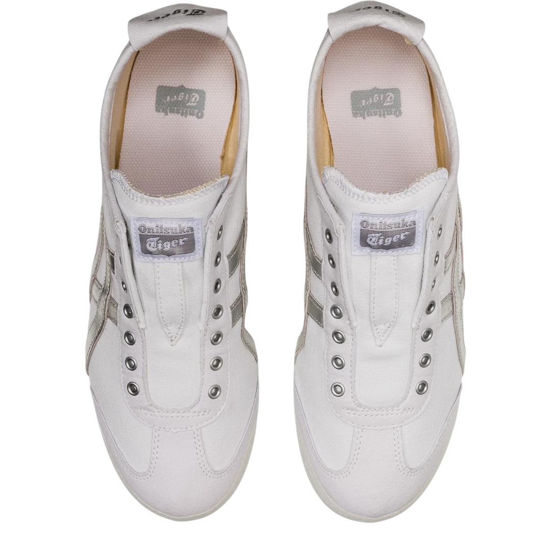 HypeSelection Onitsuka Tiger Mexico 66 slip-on sneakers in white canvas with metallic silver stripes, top-down view.