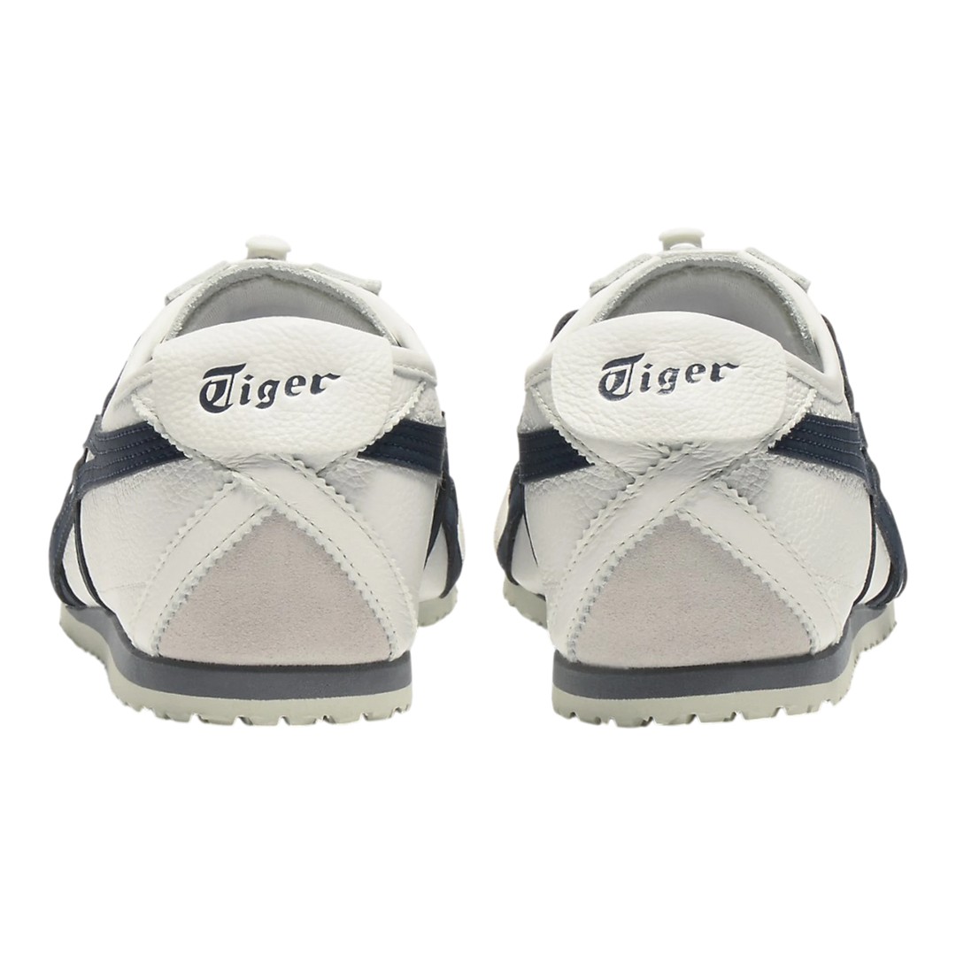 HypeSelection Onitsuka Tiger Mexico 66 VINY off-white leather sneakers with navy stripes and layered laces.