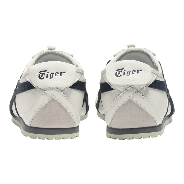 HypeSelection Onitsuka Tiger Mexico 66 VINY off-white leather sneakers with navy stripes and layered laces.