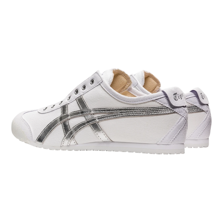 HypeSelection Onitsuka Tiger Mexico 66 slip-on sneakers in white canvas with metallic silver stripes and heel flap.