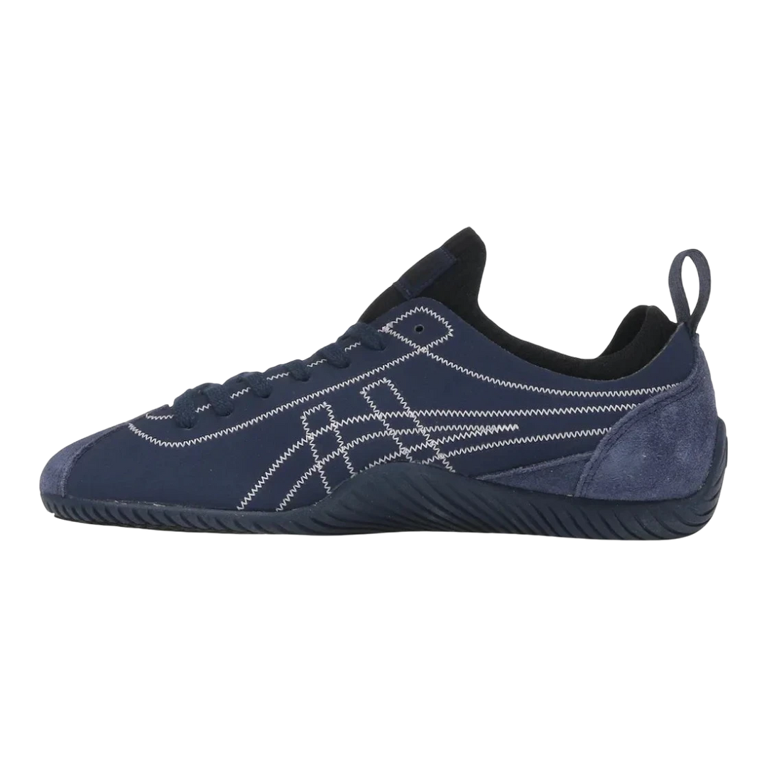 HypeSelection Onitsuka Tiger SCLAW peacoat blue knit sneaker with suede accents and white stitching.