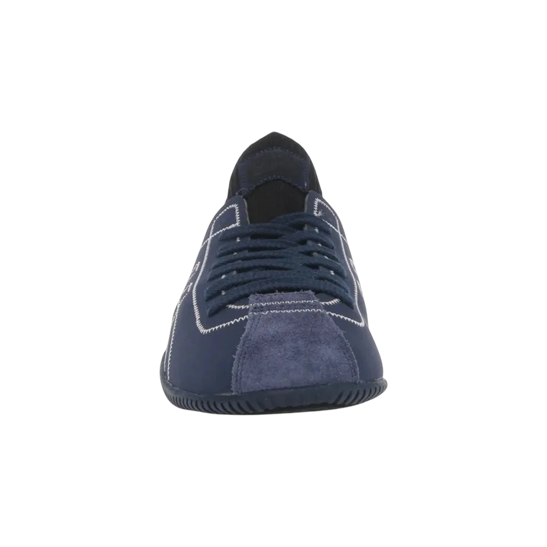 HypeSelection Onitsuka Tiger SCLAW peacoat blue knit sneakers with suede toe cap and white stitching.