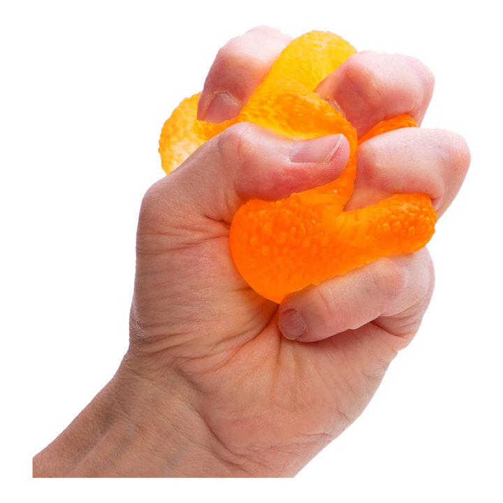HypeSelection orange NeeDoh Gumdrop sensory fidget toy being squeezed in a hand showing its textured jelly surface