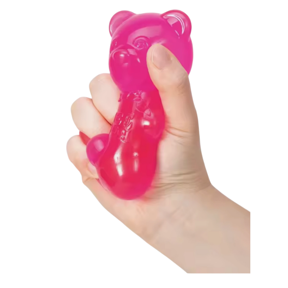 HypeSelection pink gummy bear sensory fidget toy with jelly-like filling, being squeezed in a hand.