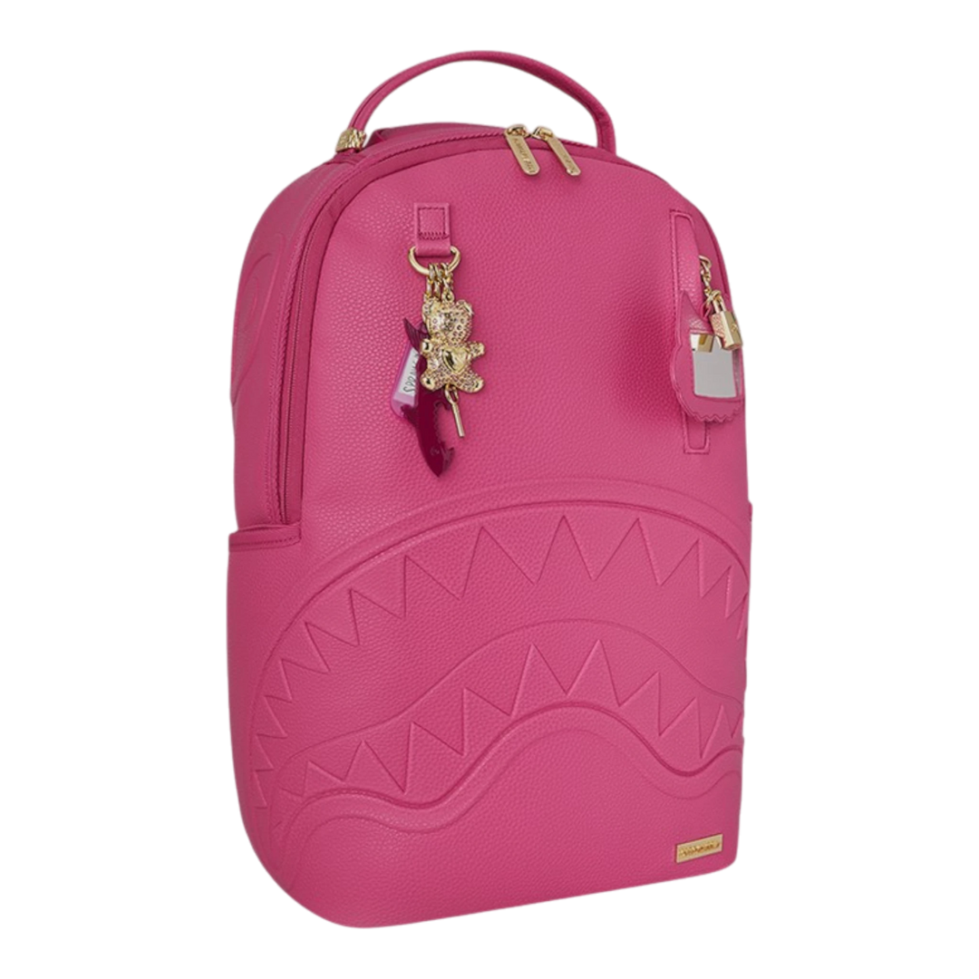 HypeSelection pink PVC backpack with iconic shark mouth design, gold hardware, and teddy bear charm.
