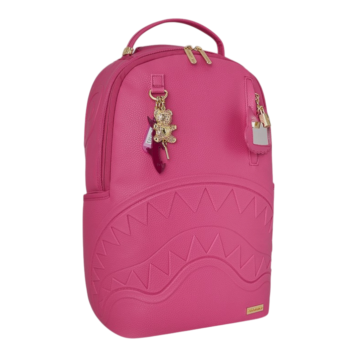 HypeSelection pink PVC backpack with iconic shark mouth design, gold hardware, and teddy bear charm.
