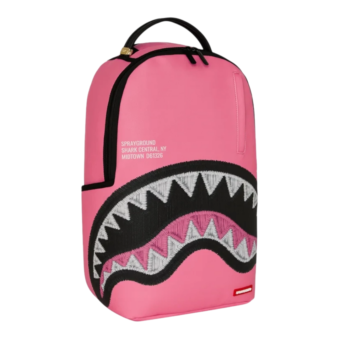 HypeSelection Sprayground Shark Central pink backpack with signature embroidered shark mouth graphic design