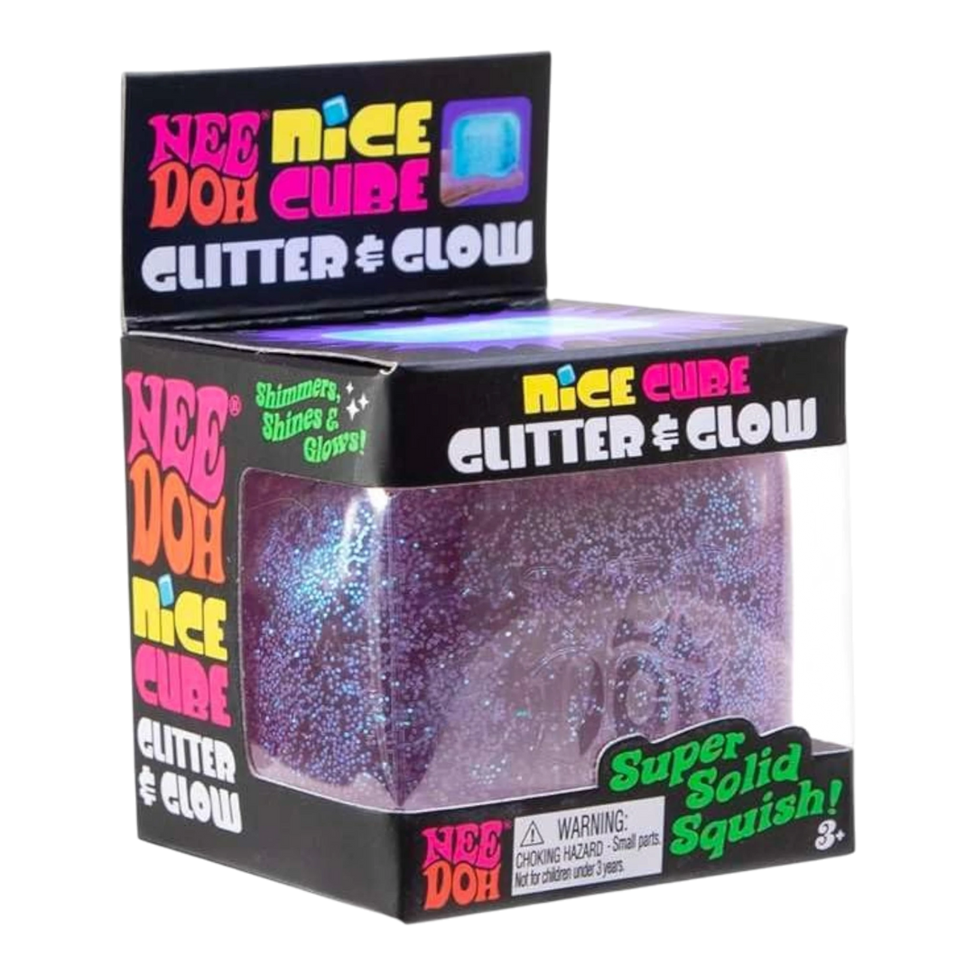 NeeDoh Nice Cube Glitter & Glow sensory fidget toy in purple with embedded glitter and glow-in-the-dark finish.