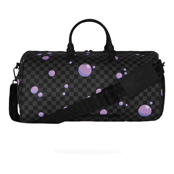 HypeSelection Purple Slime Takeover duffle bag with checkered pattern and purple bubble accents. Faux leather.