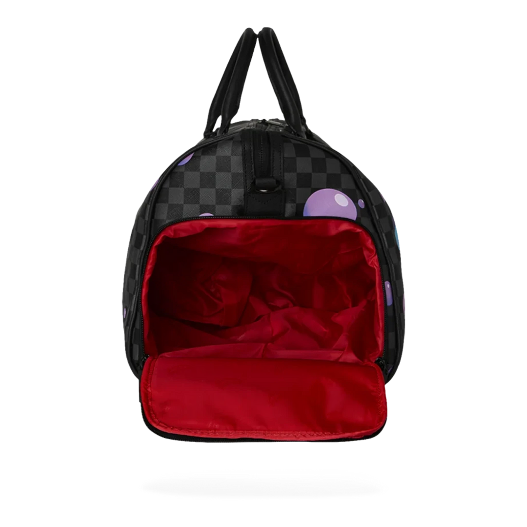 HypeSelection Purple Slime Takeover duffle bag with checkerboard pattern, purple slime bubbles, and red interior.