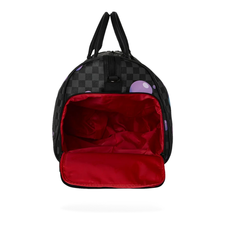 HypeSelection Purple Slime Takeover duffle bag with checkerboard pattern, purple slime bubbles, and red interior.