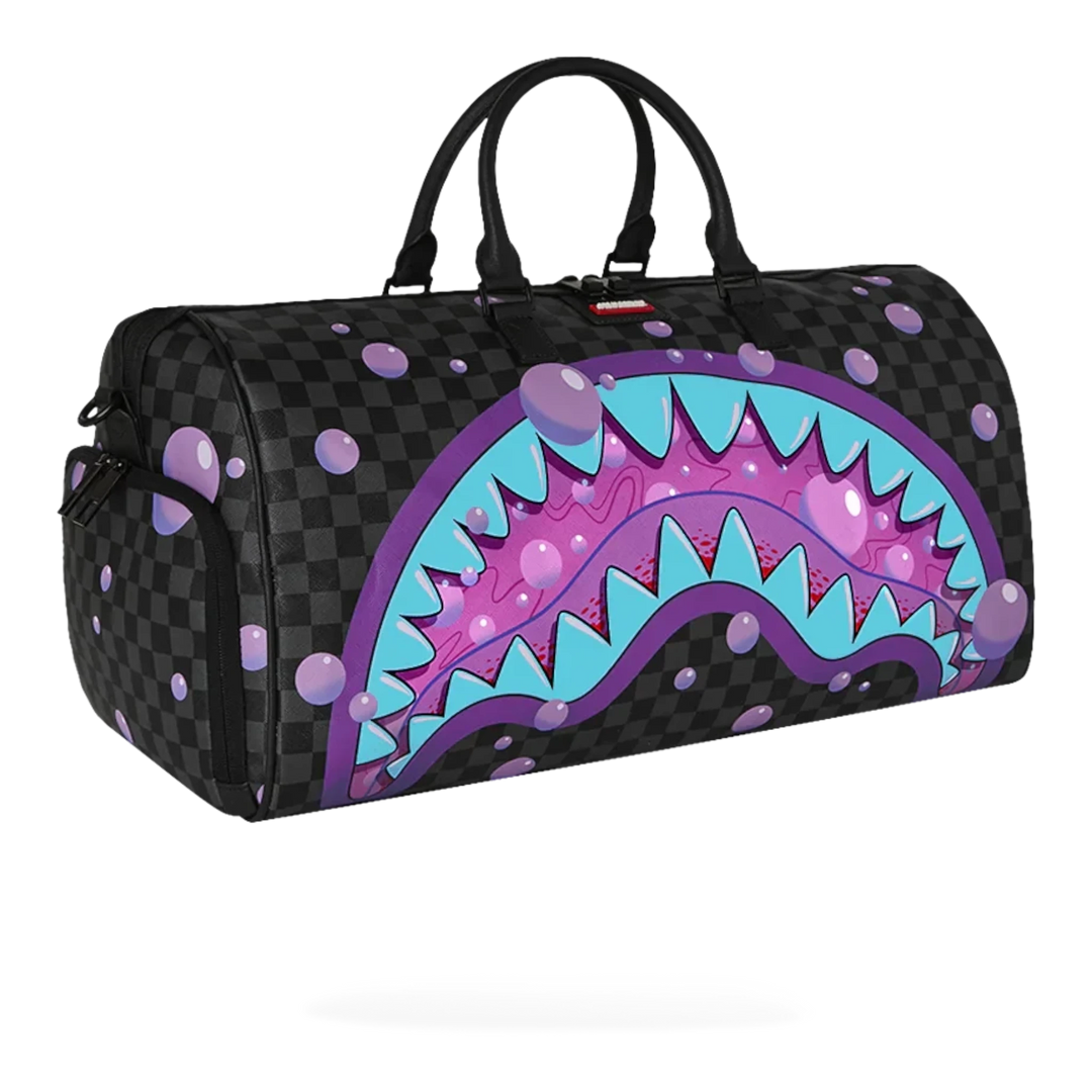HypeSelection Purple Slime Takeover duffle bag with black checkerboard pattern and purple slime shark graphic. Faux leather.