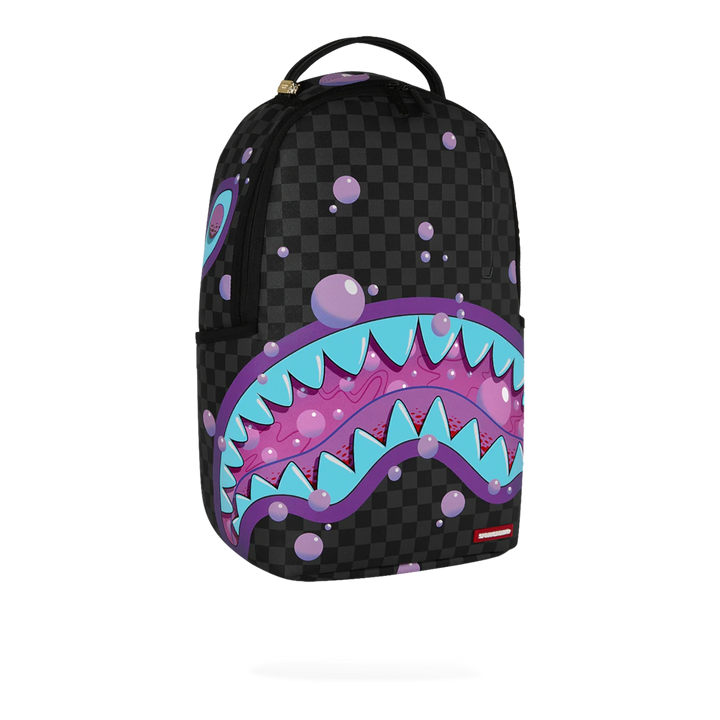HypeSelection Sprayground Purple Slime Takeover backpack with shark mouth graphic on checkered black PVC material.