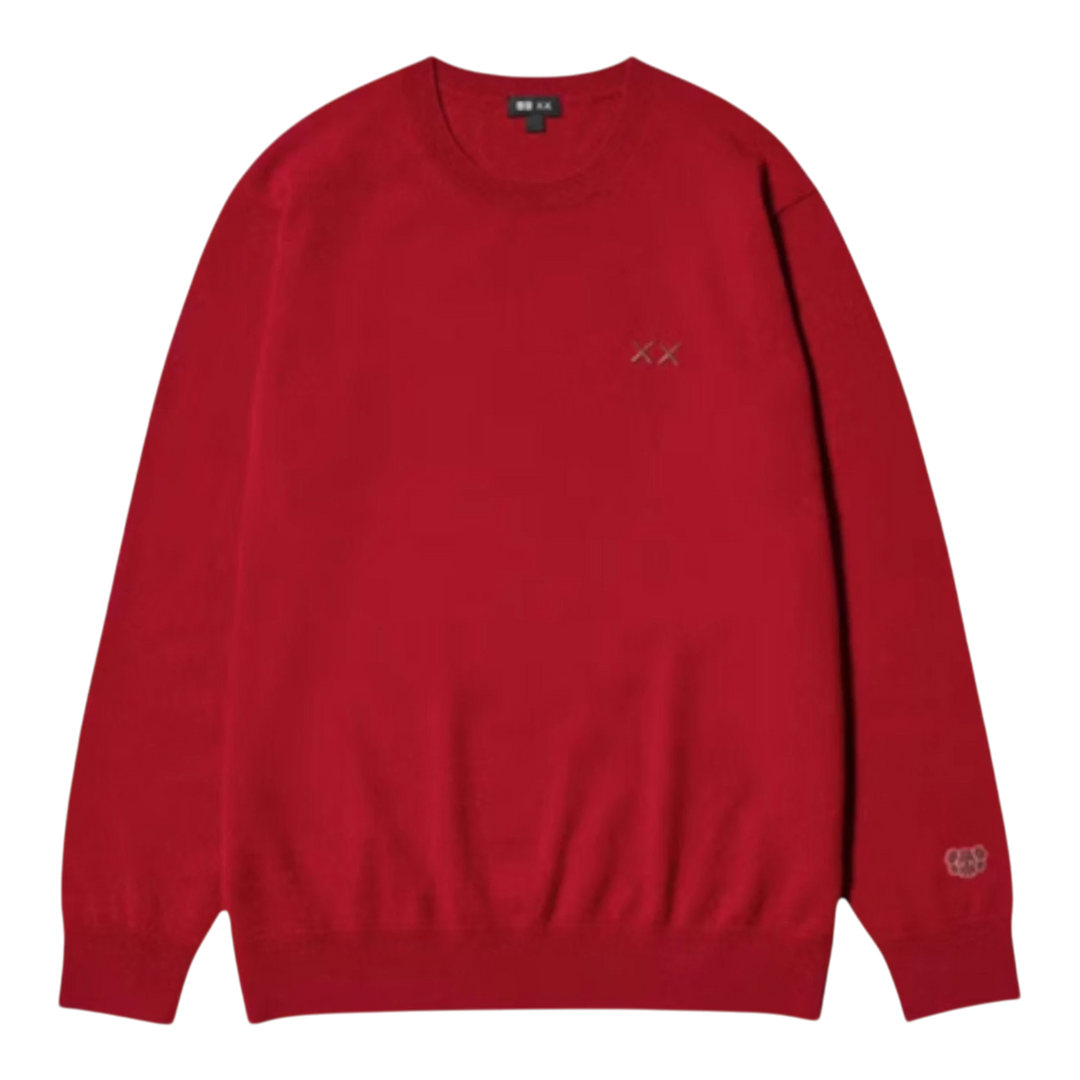 HypeSelection red 100% cashmere crew neck sweater with KAWS XX embroidery on chest and sleeve.