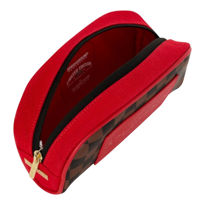 HypeSelection red and brown checkered vegan leather pouch with red trim and gold zipper, featuring "Sprayground Limited Edition" graphic.