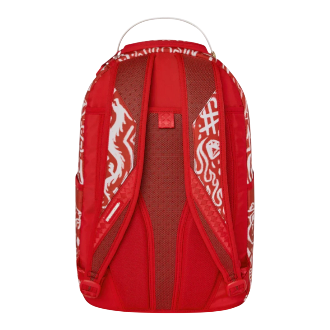 HypeSelection red faux leather backpack with white graffiti print, padded straps, and mesh back panel.