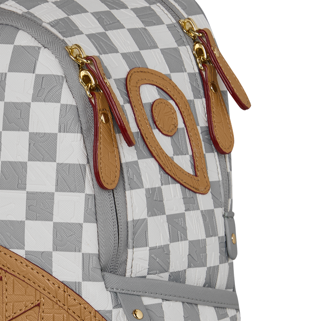 HypeSelection Sprayground Ritz Riviera Savage backpack featuring a grey and white checkerboard pattern with tan trim.