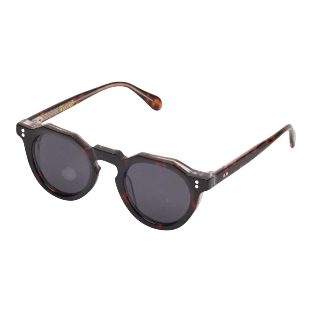 HypeSelection Ryoko ClassicCharm sunglasses with tortoise acetate frame and navy blue lenses. Vintage-inspired round silhouette.