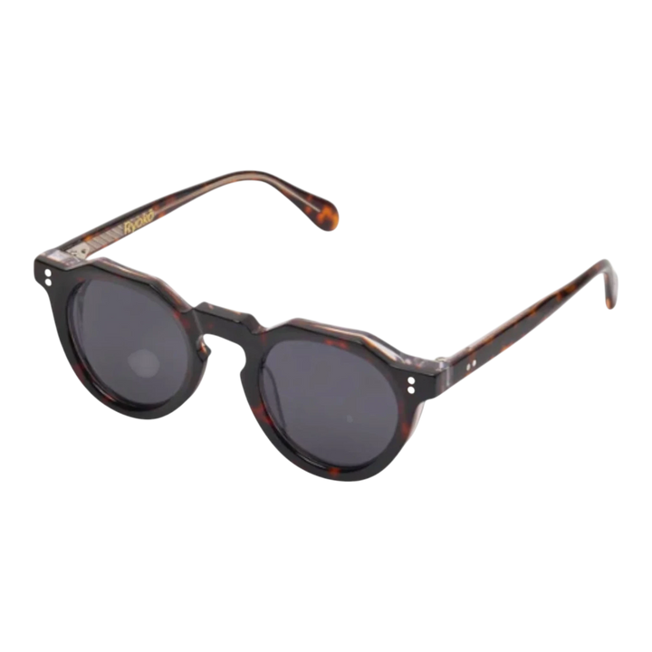 HypeSelection Ryoko ClassicCharm sunglasses with tortoise acetate frame and navy blue lenses. Vintage-inspired round silhouette.