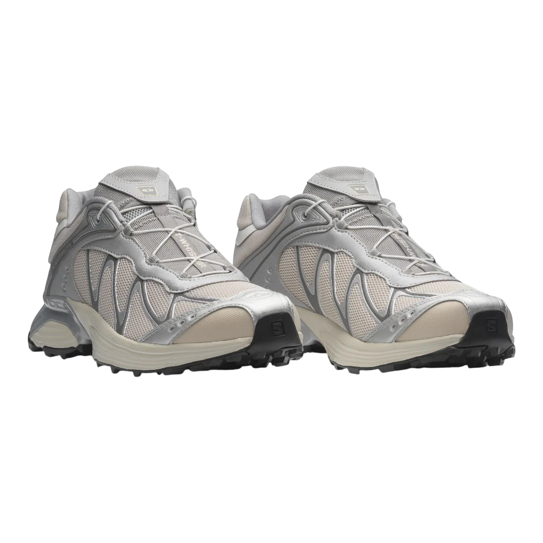 HypeSelection Salomon XT-WHISPER FTW sneakers in silver and lunar rock with Quicklace system and cushioned sole.