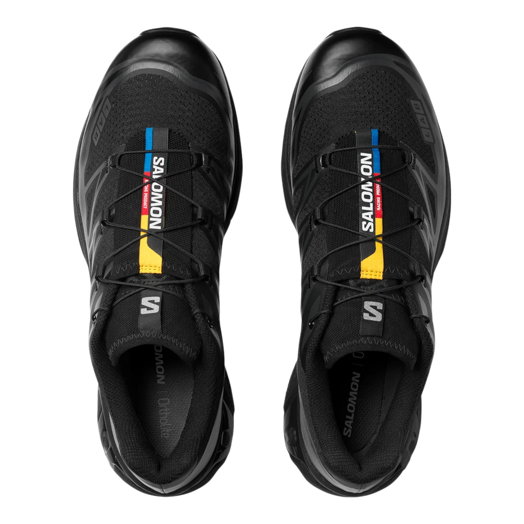 HypeSelection Salomon XT6 black trail running shoes with Quicklace system and colorful stripe detail on tongue.
