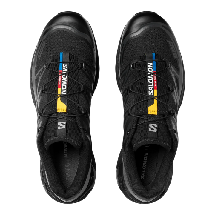 HypeSelection Salomon XT6 black trail running shoes with Quicklace system and colorful stripe detail on tongue.
