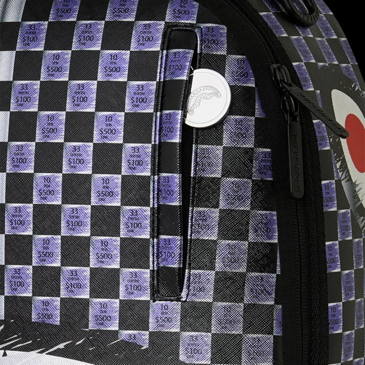 HypeSelection Sprayground Scratch Off Shark DLXSV backpack featuring a black and purple checkerboard money pattern